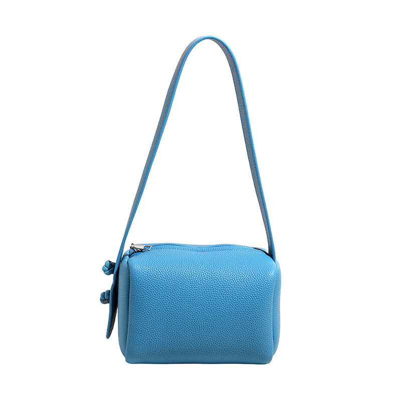 Women’s shoulder bag in modern design with structured surface