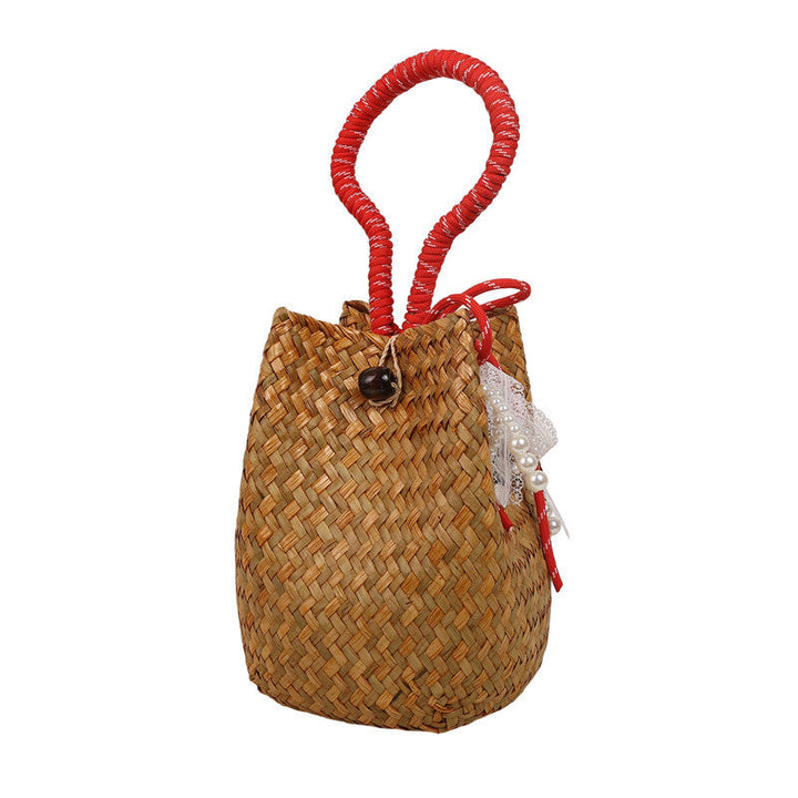 Women's hand-woven shoulder bag with decorative drawstring
