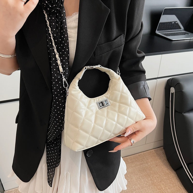 Women Mini-Bag with elegant quilted design and stylish chain closure