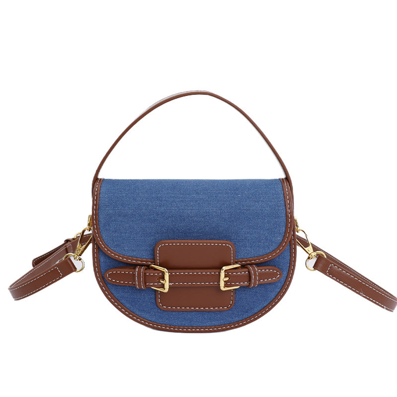 Women’s shoulder bag made of durable denim with leather accents