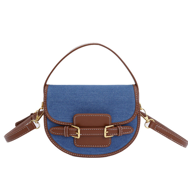 Women’s shoulder bag made of durable denim with leather accents