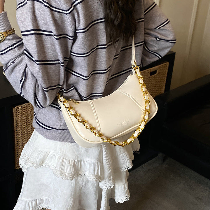 Women's shoulder bag with elegant chain accent