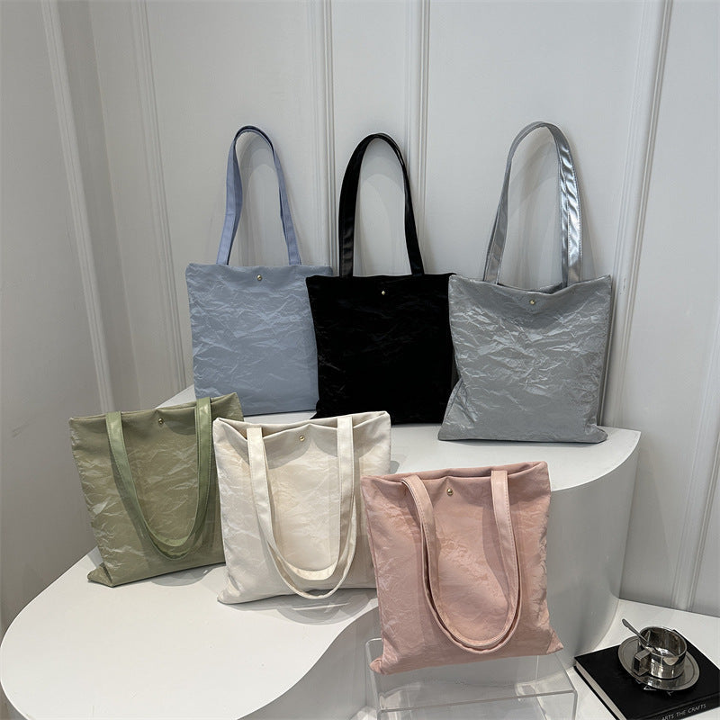 Women's tote bag made of high-quality synthetic leather with a textured surface