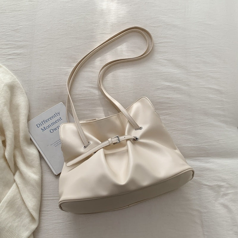 Women's shoulder bag made of high-quality synthetic leather with adjustable drawstring
