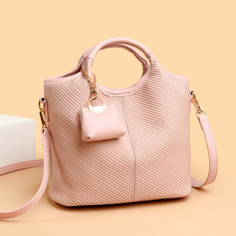 Ladies elegant handbag with textured design and removable mini organizer