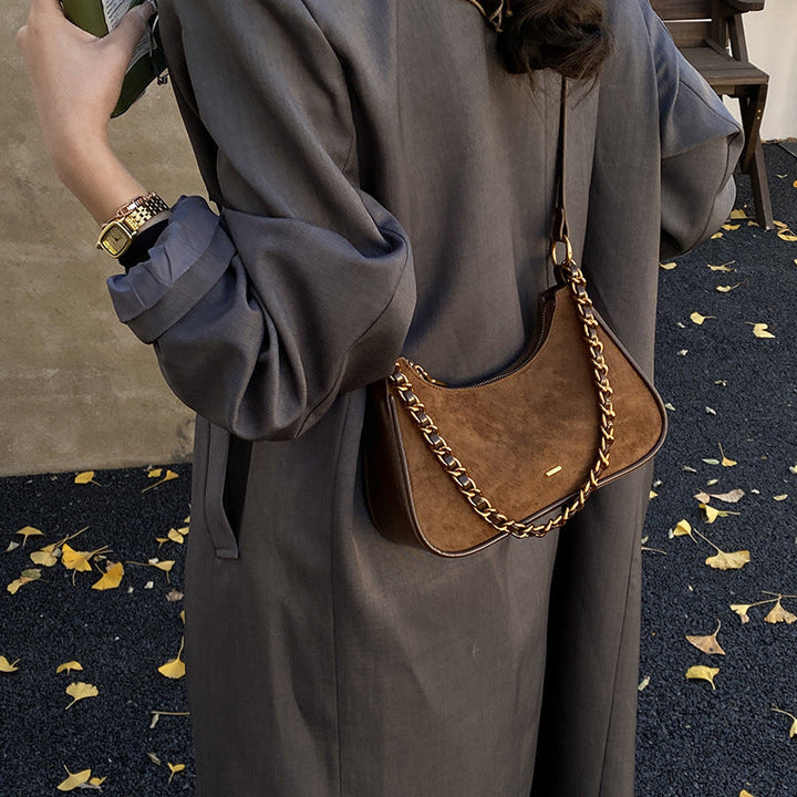 Women's fashionable shoulder bag in vintage look with chain strap