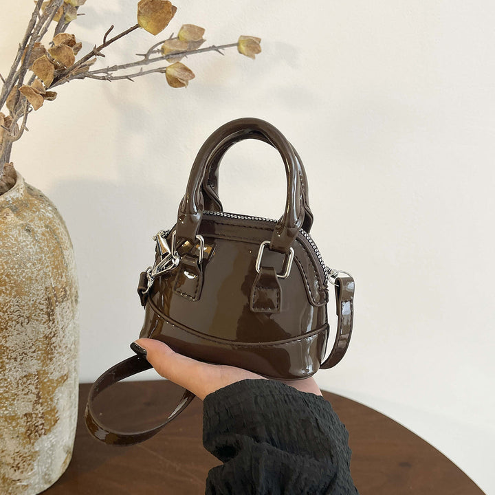 Women's mini handbag with glossy surface and fashionable zipper