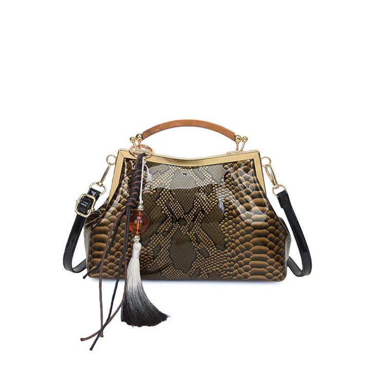 Ladies elegant tote bag in stylish snake leather look