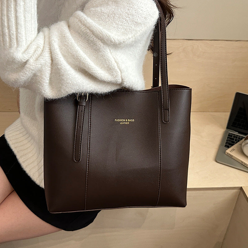 Women's elegant tote bag made of high-quality faux leather with distinctive design