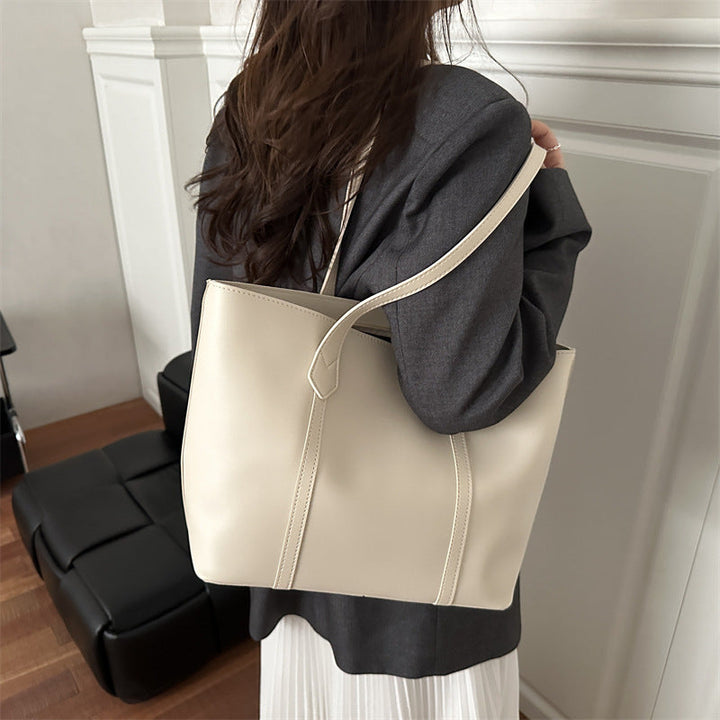 Women's elegant tote bag with minimalist structure