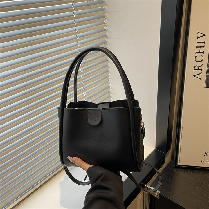 Ladies elegant mini handbag with practical flap closure