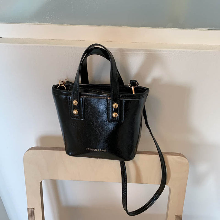 Women’s mini handbag with elegant chain closure