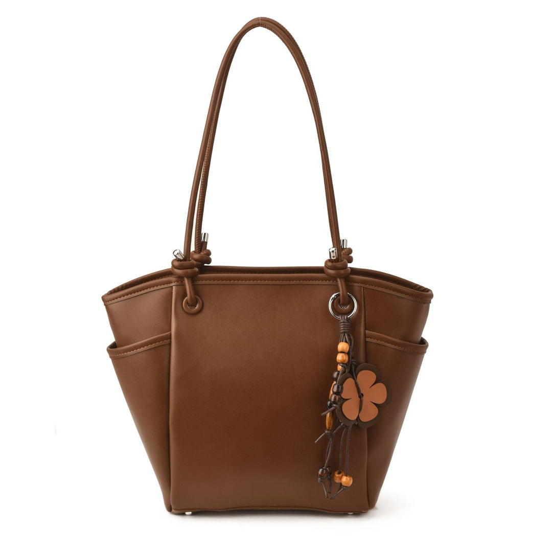 Women's practical shoulder bag with charming appliqués