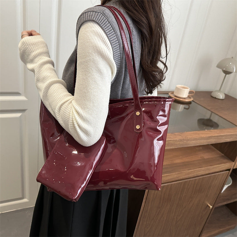 Women's elegant patent leather tote with removable interior compartment