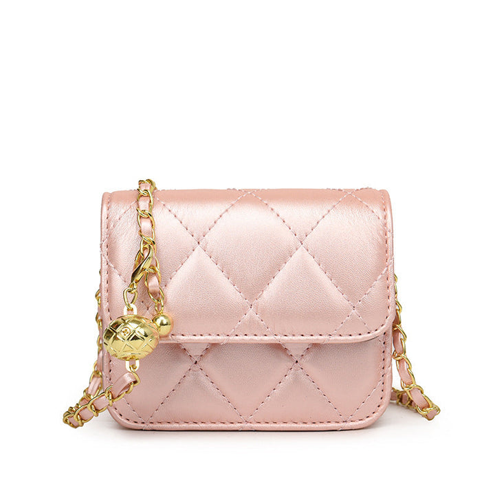 Ladies mini crossbody bag with shiny chain and charming pendant