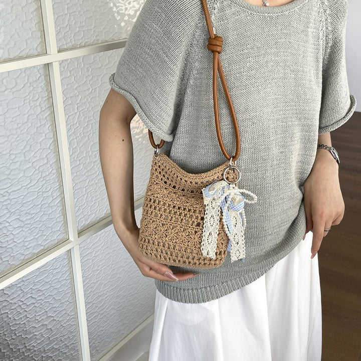 Women crocheted shoulder bag with decorative details