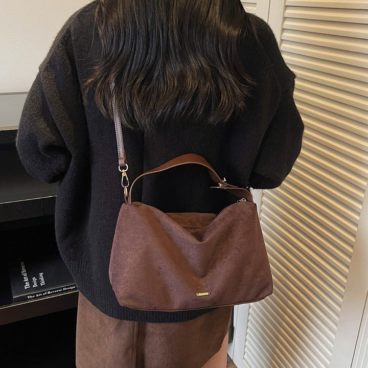 Women's practical shoulder bag made of soft suede
