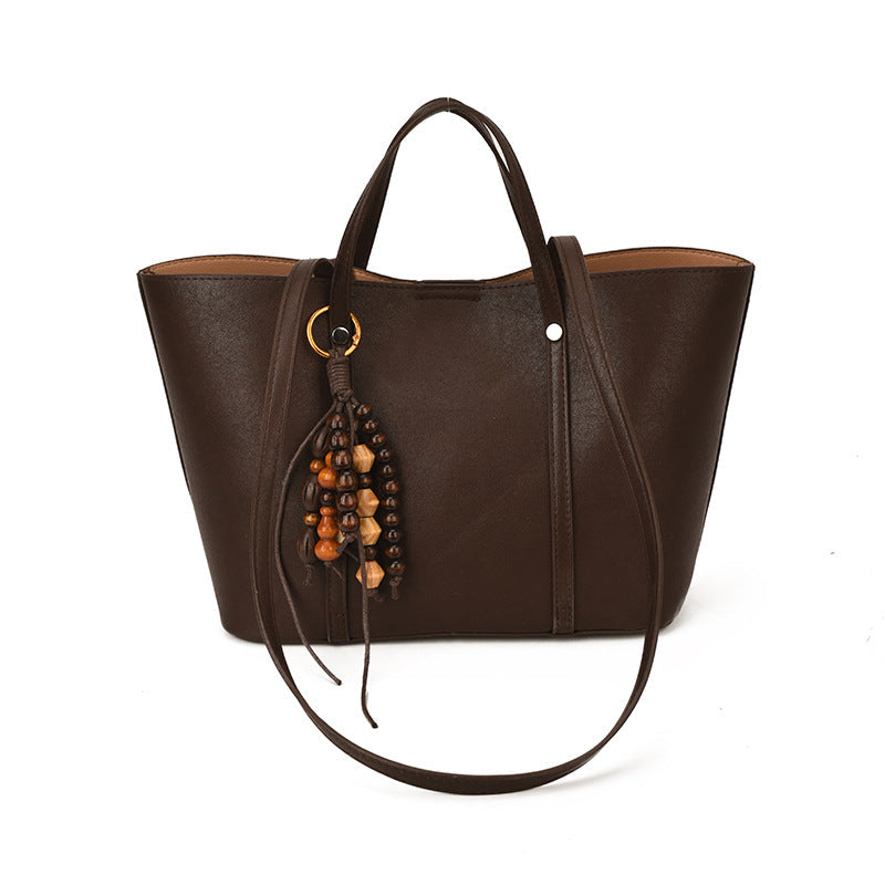 Women's Tote Bag with Modern Design and Unique Beaded Pendant