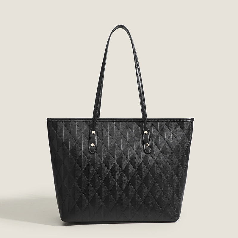 Women's tote bag with elegant diamond design and practical inner compartments