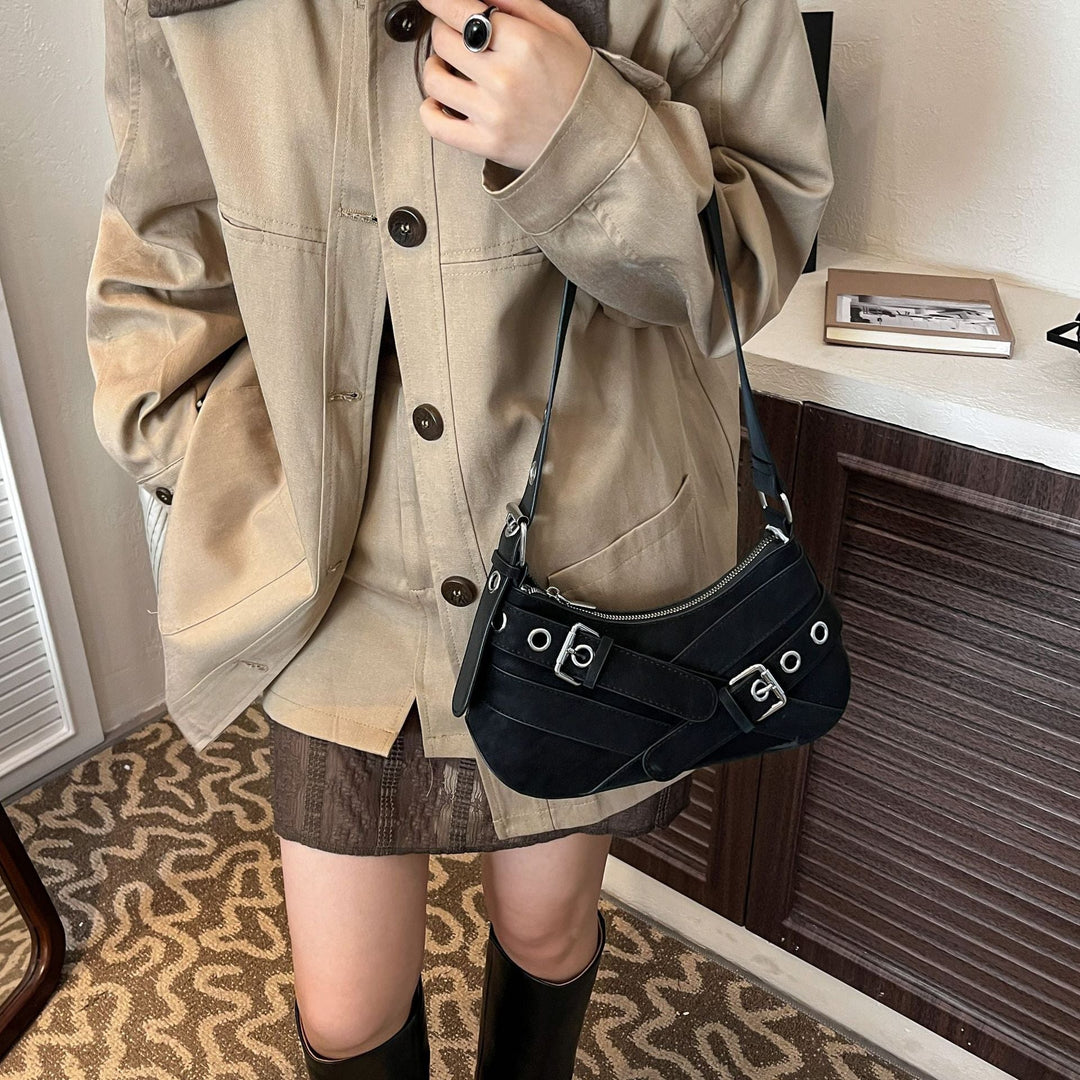 Women's fashionable shoulder bag made of soft suede leather with unique appliqué