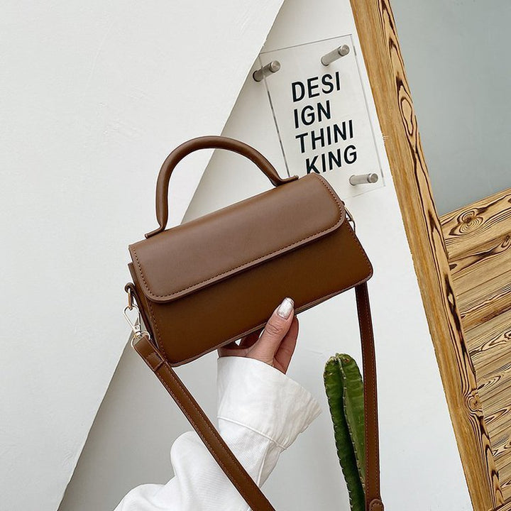 Ladies elegant shoulder bag with detachable carrying strap