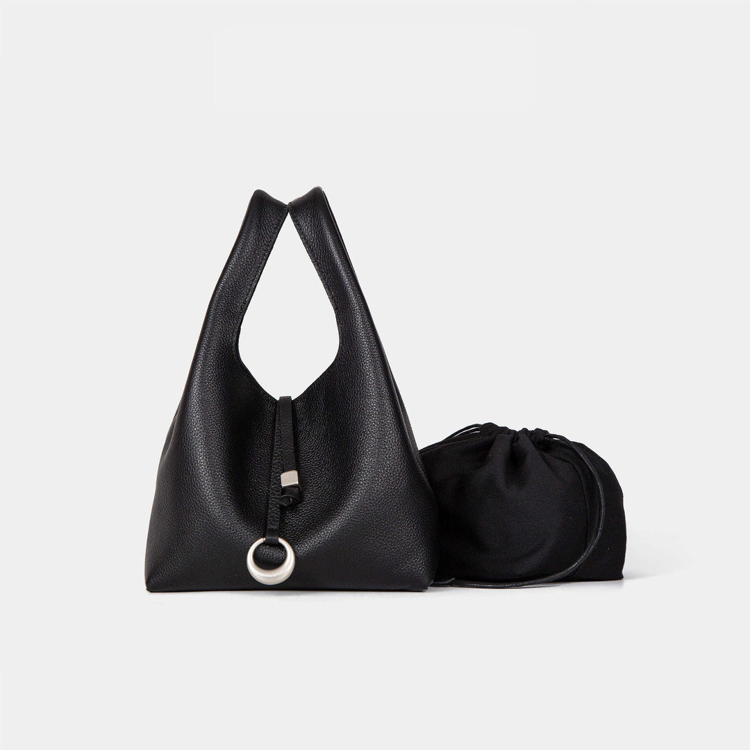 Women's elegant tote bag with innovative closure