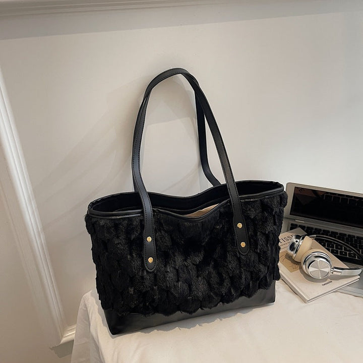 Women's tote bag made of high-quality synthetic leather with textured surface