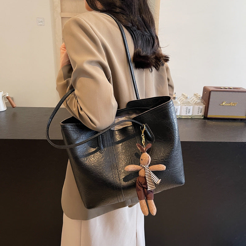 Ladies stylish tote bag with charming keychain