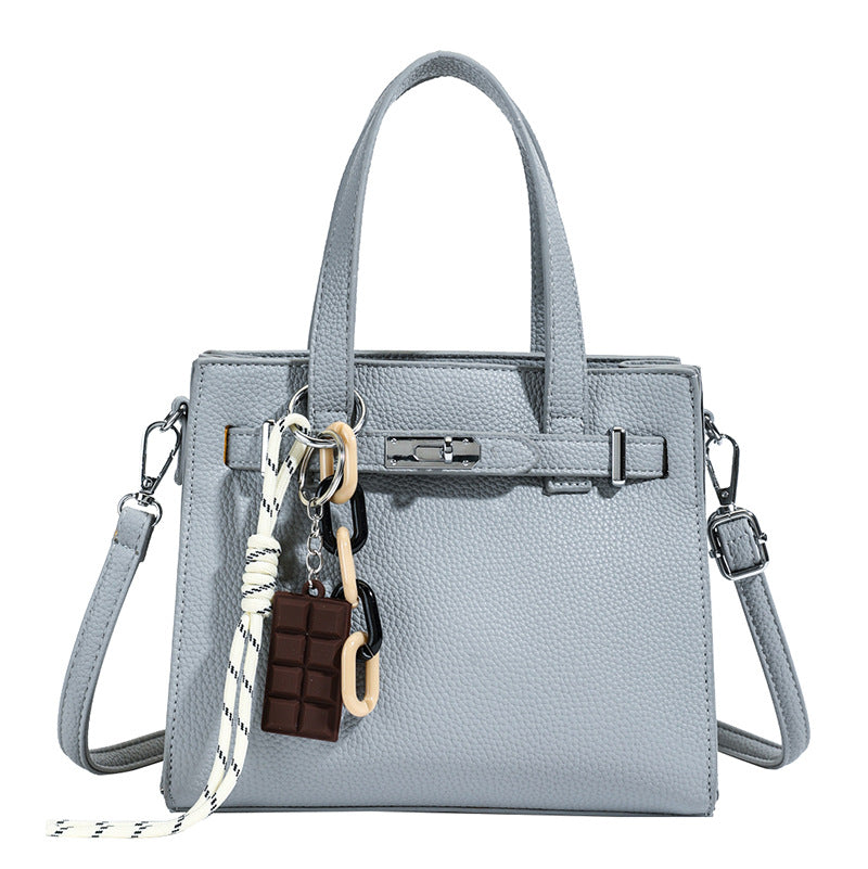 Ladies elegant mini bag with detachable pendant