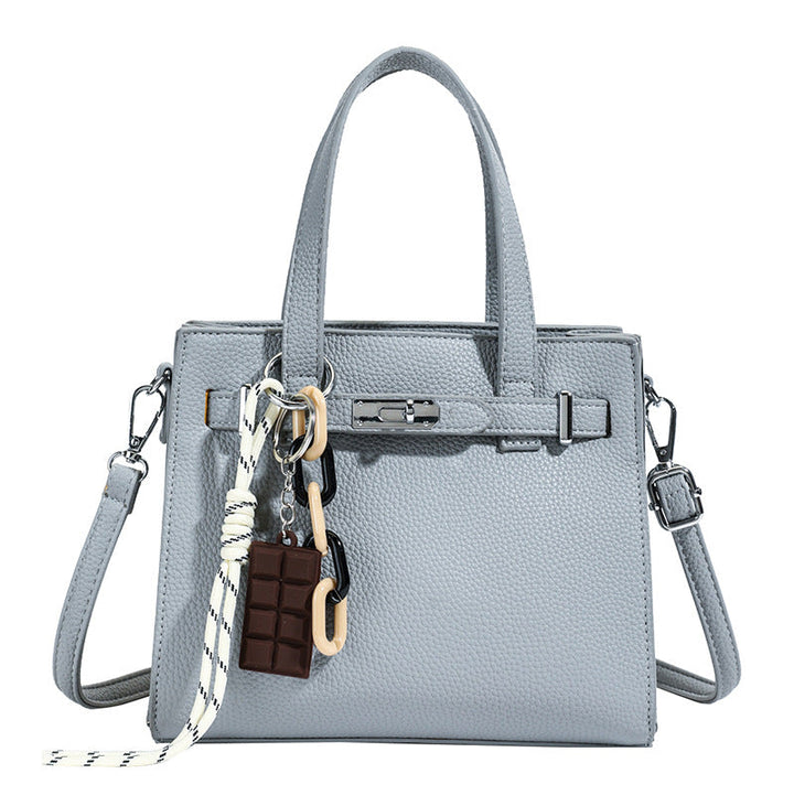 Ladies elegant mini bag with detachable pendant