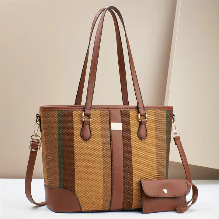 Women's tote bag with textured outer material and removable mini clutch