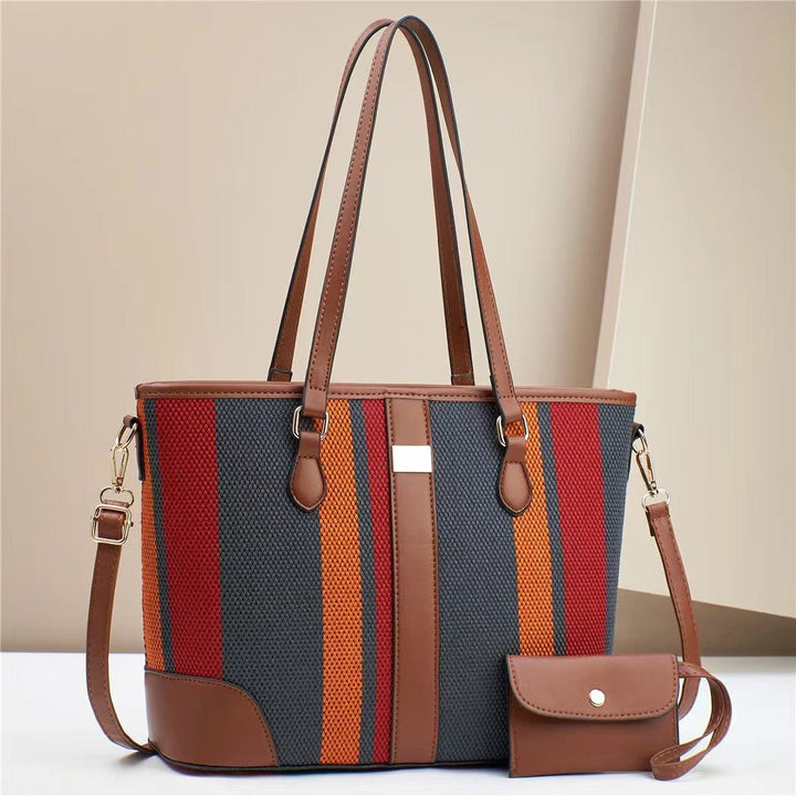 Women's tote bag with textured outer material and removable mini clutch