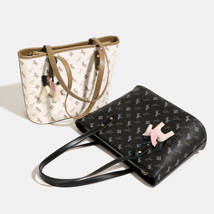 Women's casual tote bag with playful design and detachable pendant