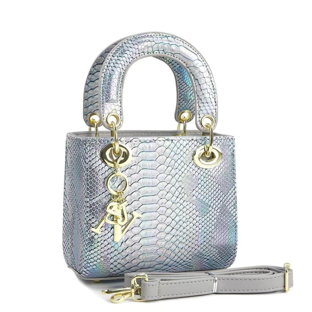 Ladies elegant mini handbag in modern snakeskin look with removable shoulder strap