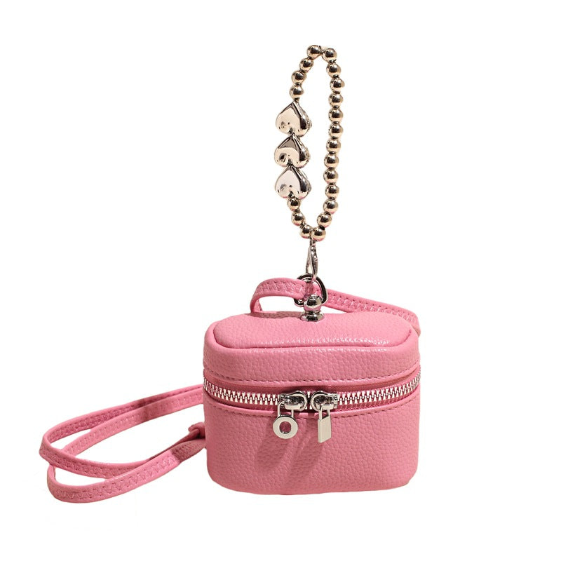 Ladies mini handbag with luxurious chain pendant