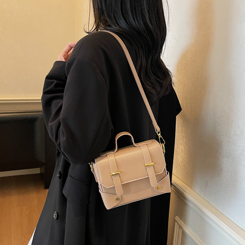 Women's mini handbag with textured design and detachable shoulder strap