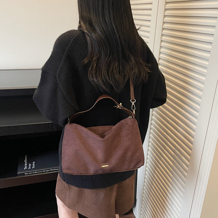 Women's practical shoulder bag made of soft suede
