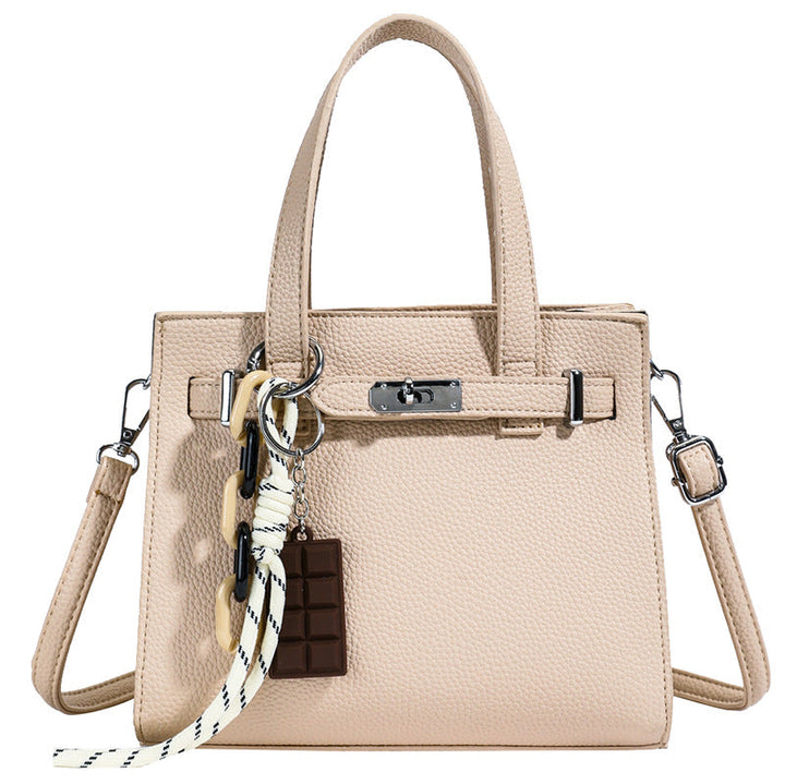 Ladies elegant mini bag with detachable pendant