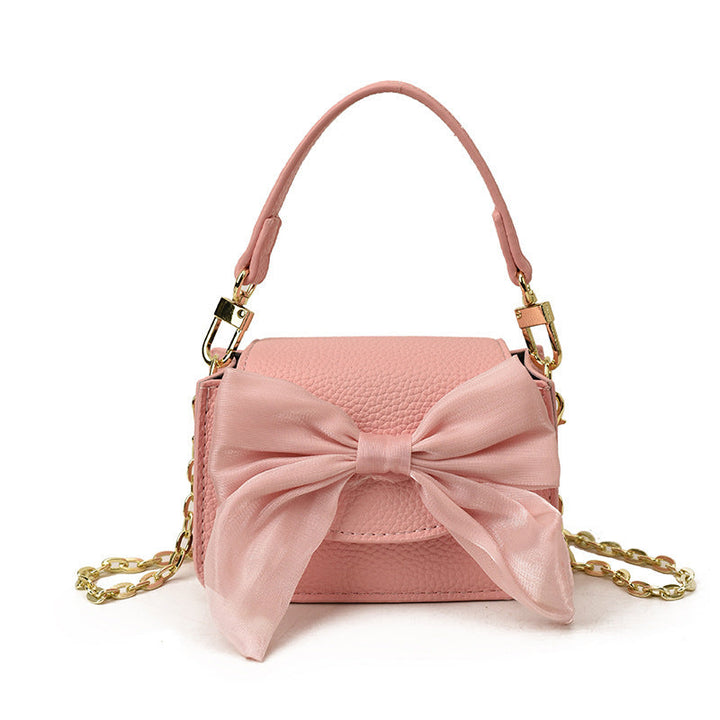 Ladies mini handbag with decorative bow design