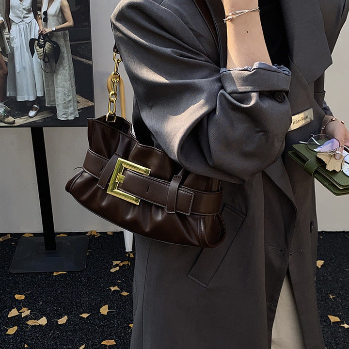 Women's crossbody bag with elegant chain accent and soft upper material
