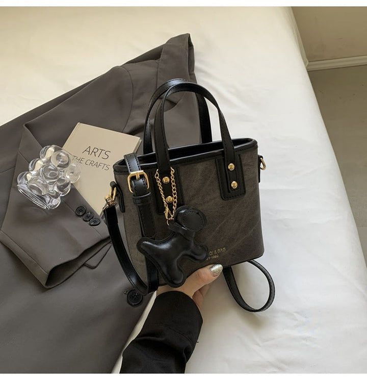 Women's mini handbag with removable charm
