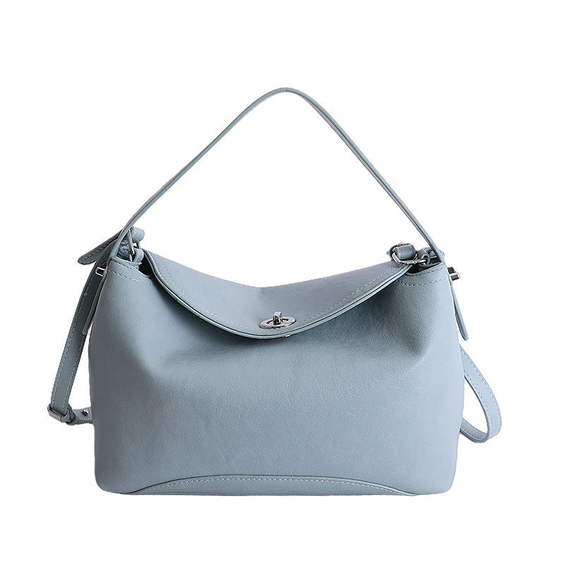 Women's handbag with flexible strap and elegant design