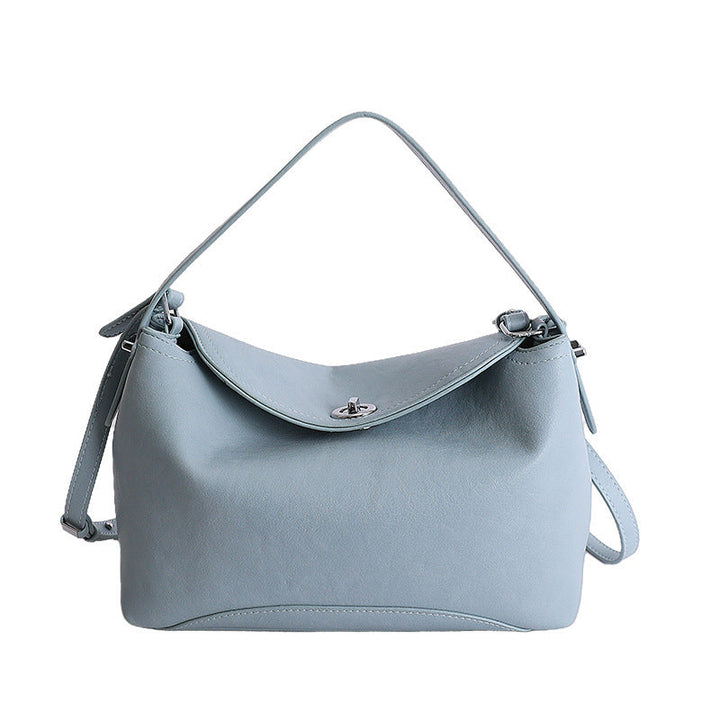 Women's handbag with flexible strap and elegant design