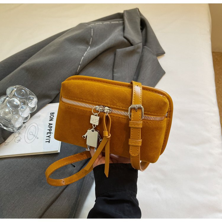 Women's practical shoulder bag made of high-quality suede leather