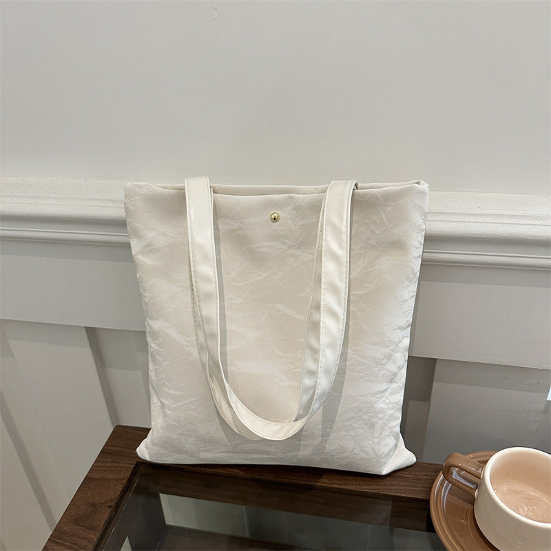 Women's tote bag made of high-quality synthetic leather with a textured surface