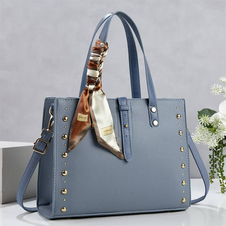 Ladies elegant tote bag with golden studs and fashionable scarf