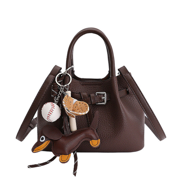 Women Designer Bucket Bag with playful animal charm