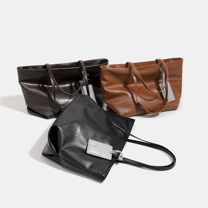 Women high-quality tote bag made of soft synthetic leather with textured design