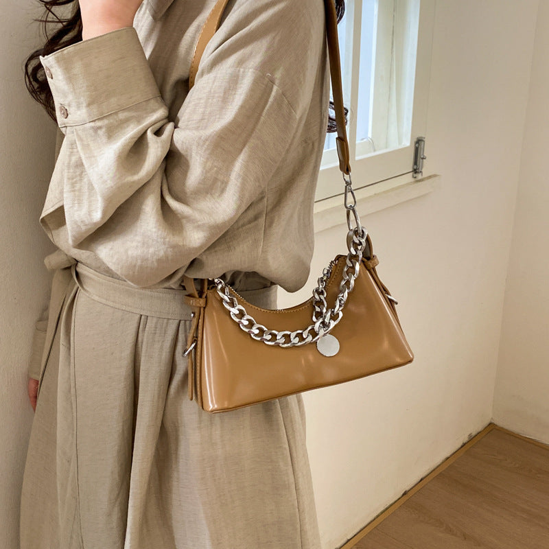 Women's fashionable shoulder bag with sparkling chain accent