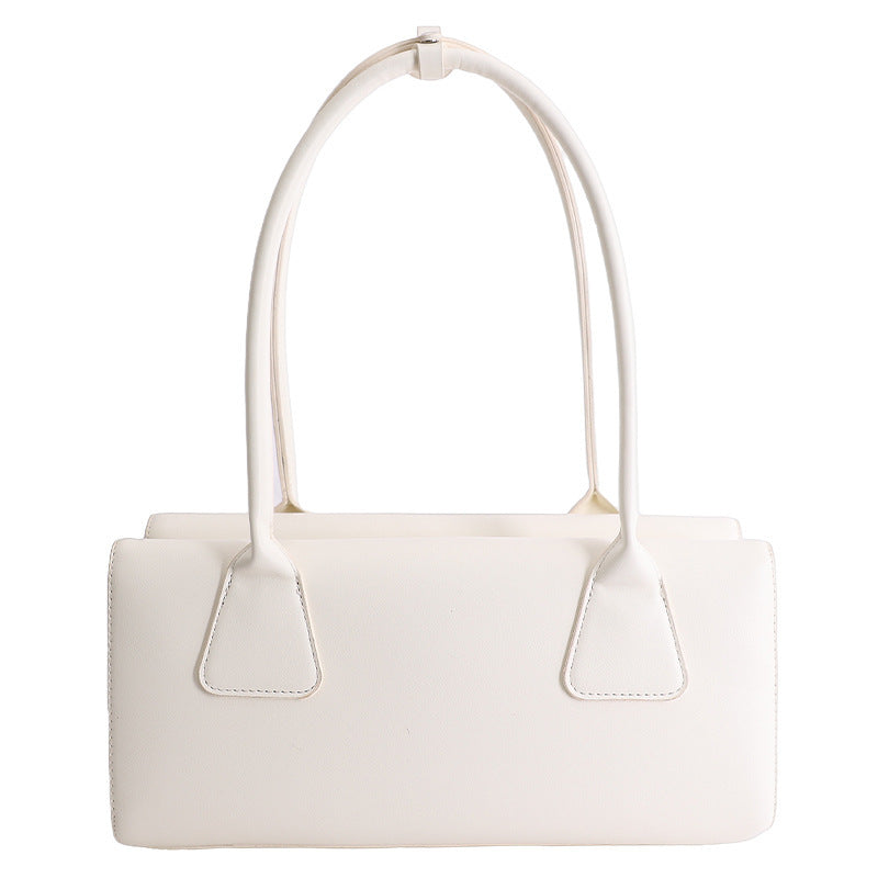 Ladies elegant handbag with minimalist silhouette